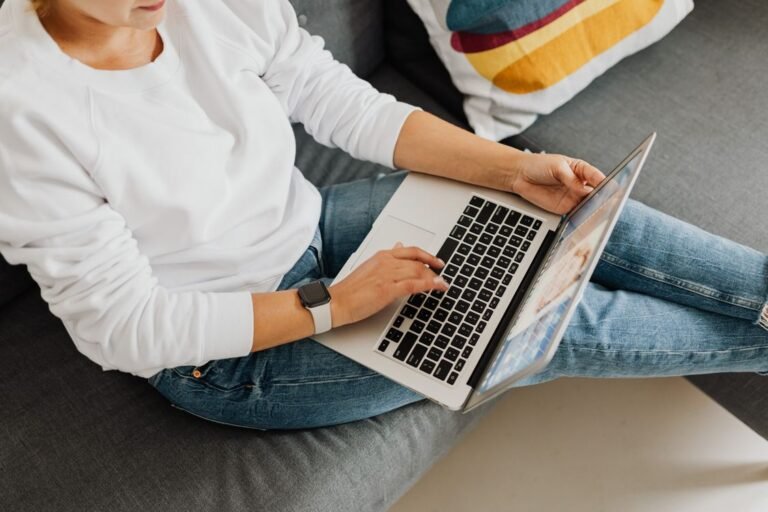 Person using a laptop at home, wifi keeps dropping fix